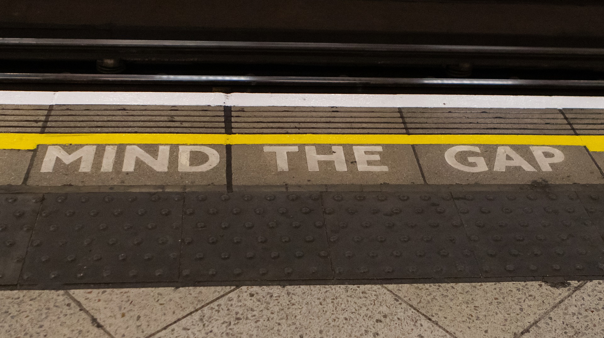 Mind the gap Tube floor sign